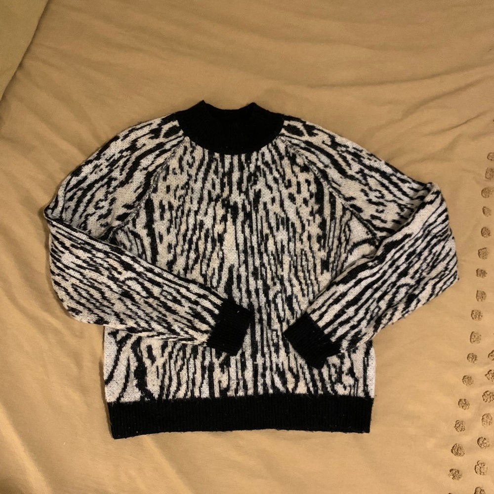 Free People animal print sweater.